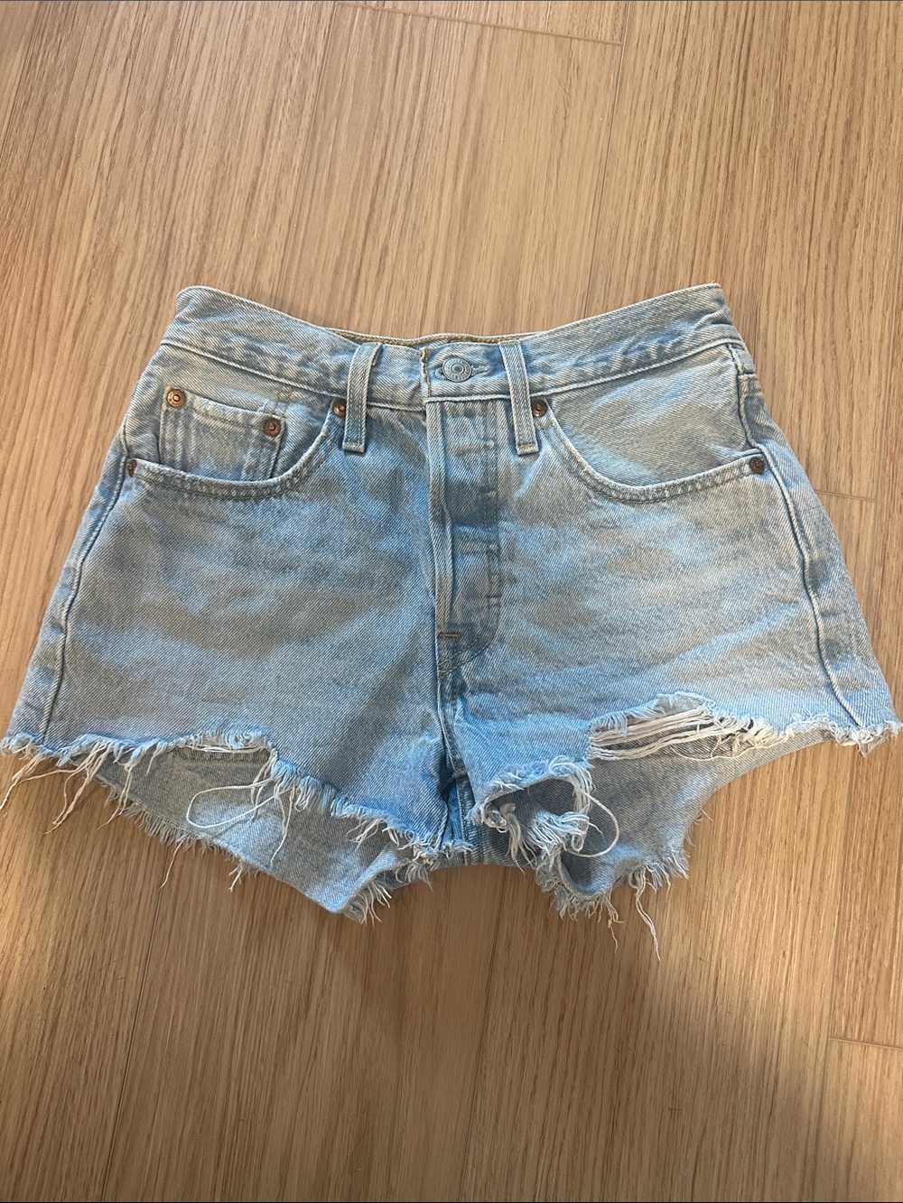 Levi’s 501 High-Rise Light Blue Distressed Denim Cutoff Shorts